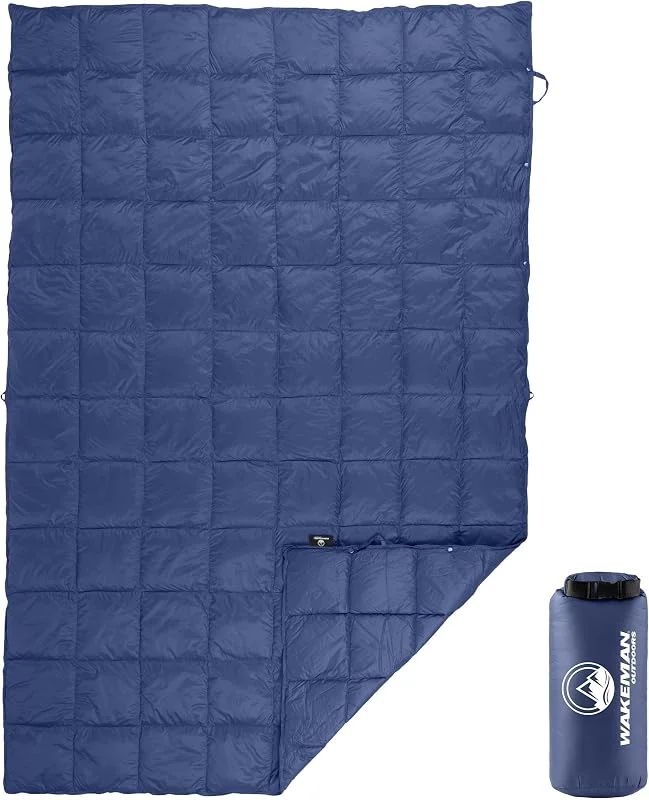 Wakeman Outdoors - Manta de plumón plegable de 78 x 52 pulgadas, ultraligera, compacta, con bolsa, equipo de dormir hinchado para campamento, senderismo, mochileros, estadio, festivales o playa (azul) — Plumon fino